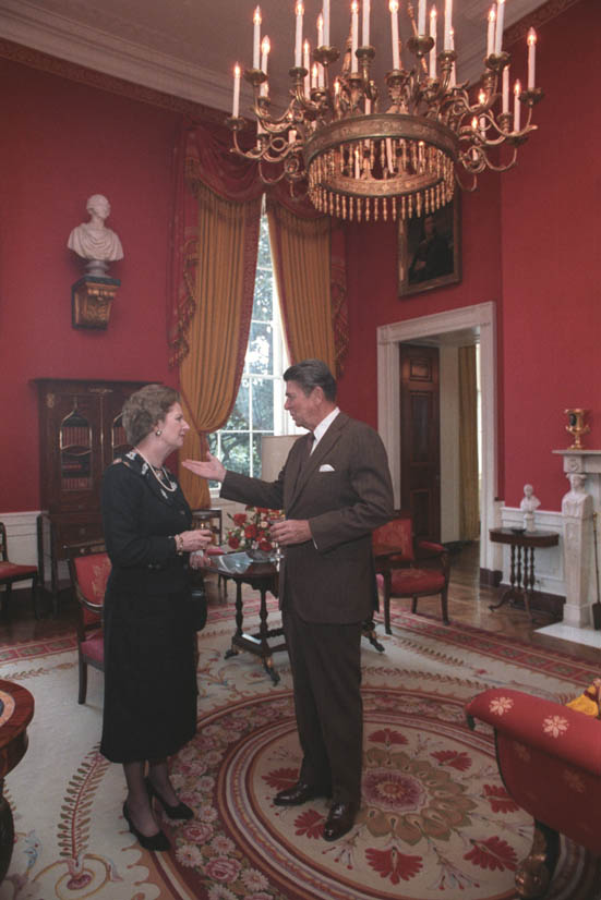 Ronald Reagan and Margaret Thatcher enjoying a glass of wine